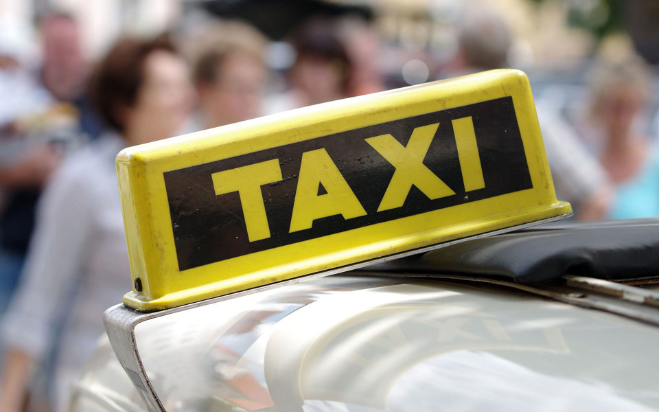 Taxiskylt.